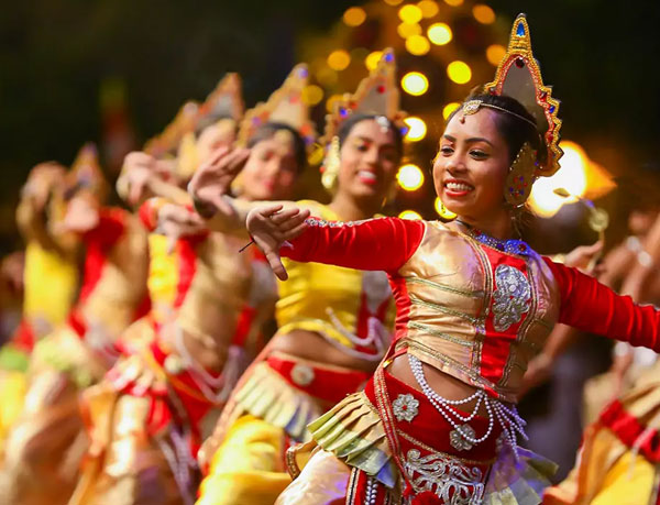 Kandy Perahera Maha Randoli procession with gold decorated elephants and traditional Sri Lankan cultural performances