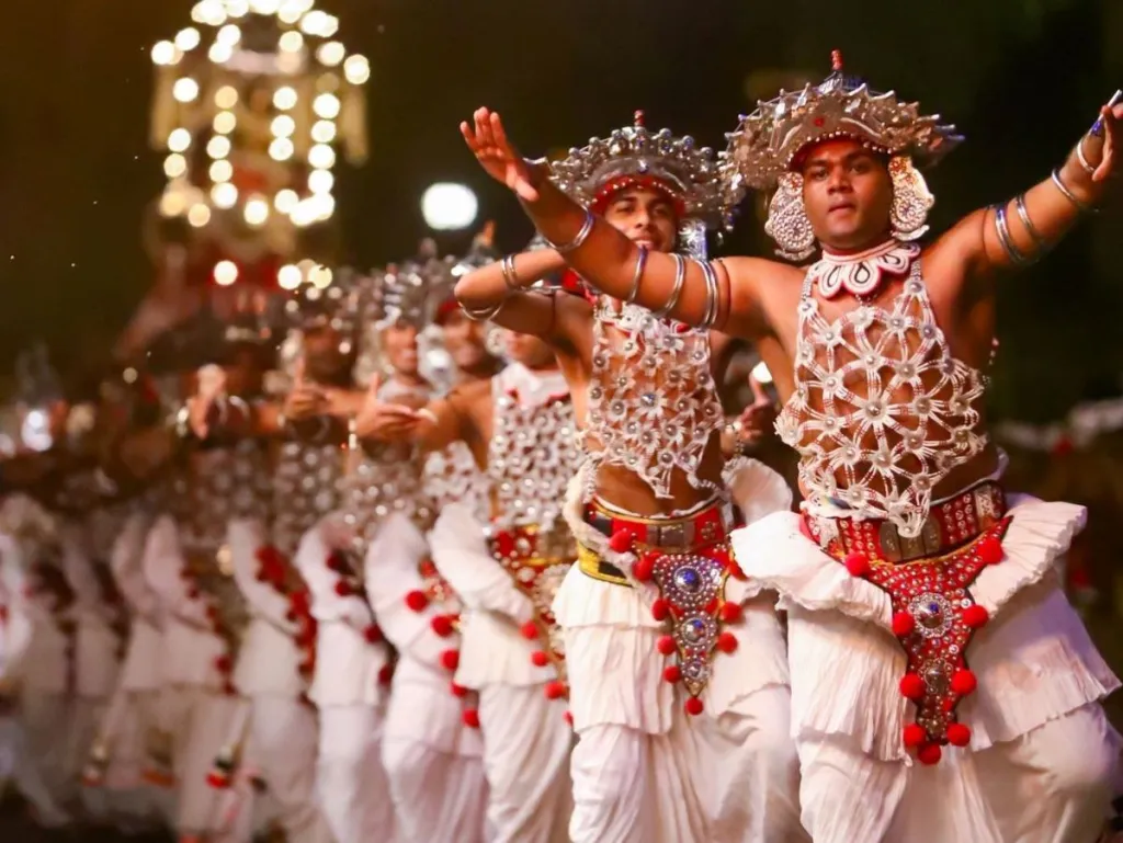 Sacred Tooth Relic procession during Kandy Perahera with Kandyan dancers and fire dancers